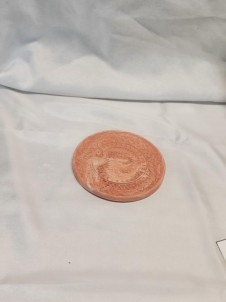 Vide poche rond à relief