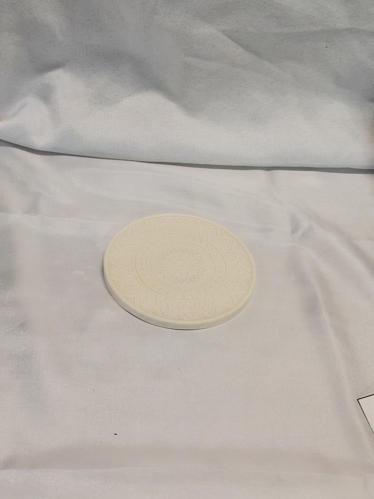 Vide poche rond à relief