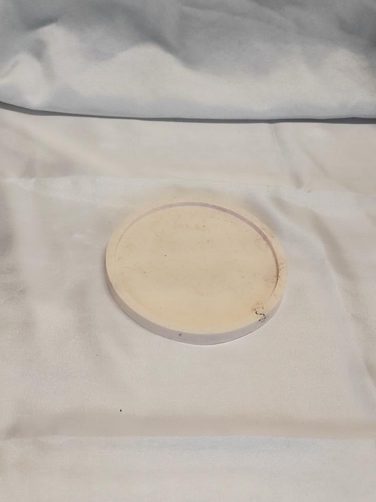 Vide poche rond à relief